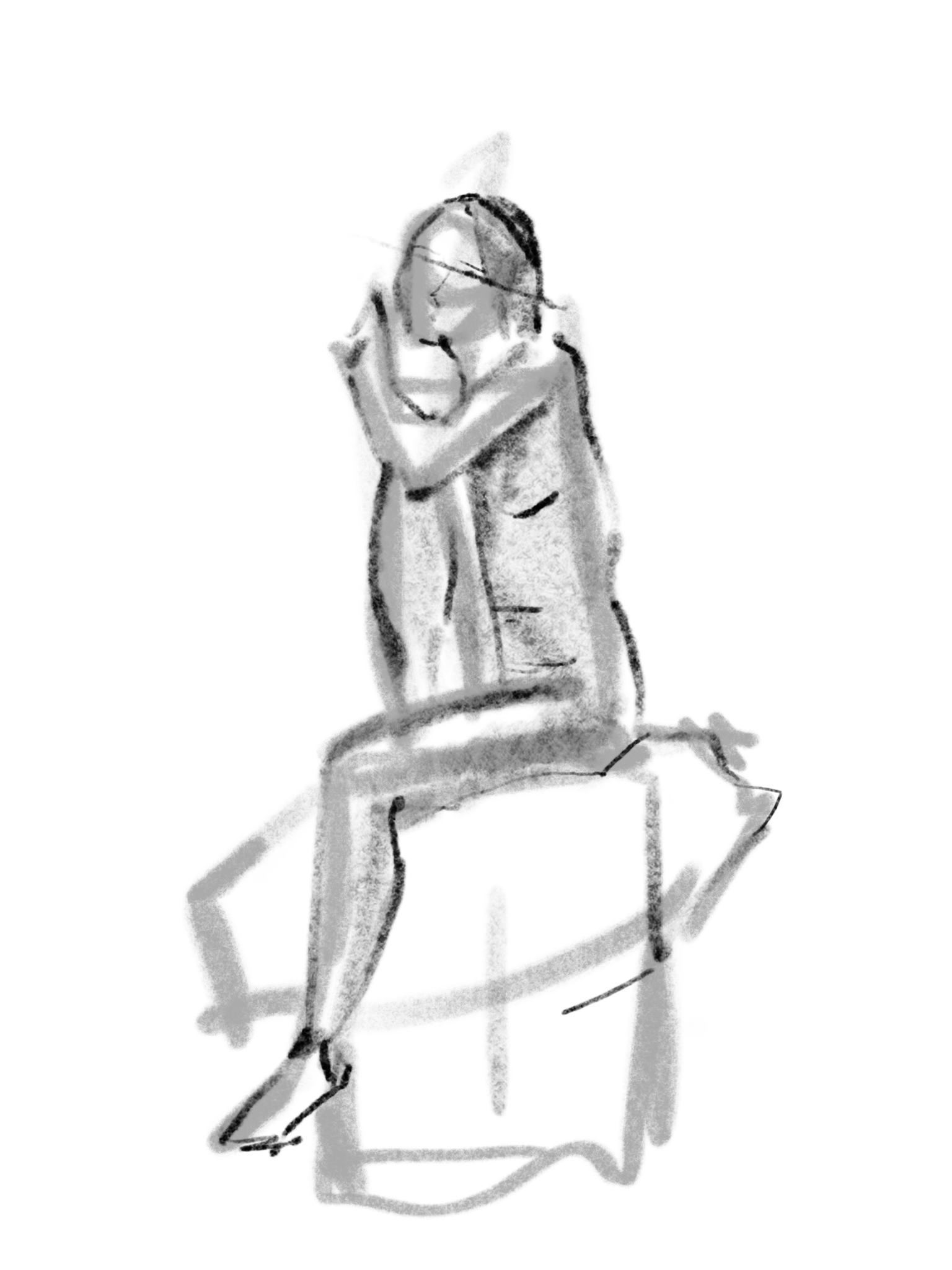 Seated figure resting their head on their arms